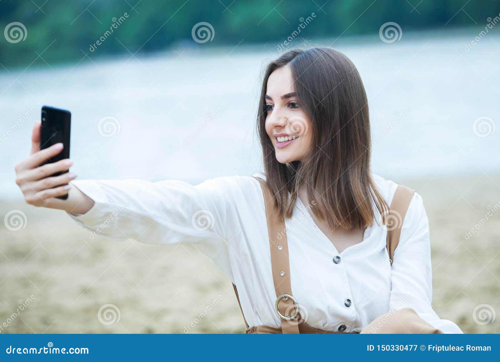 Girl Outdoors Texting On Her Mobile Phone Girl With Phone Portrait Of A Happy Woman Text Sms