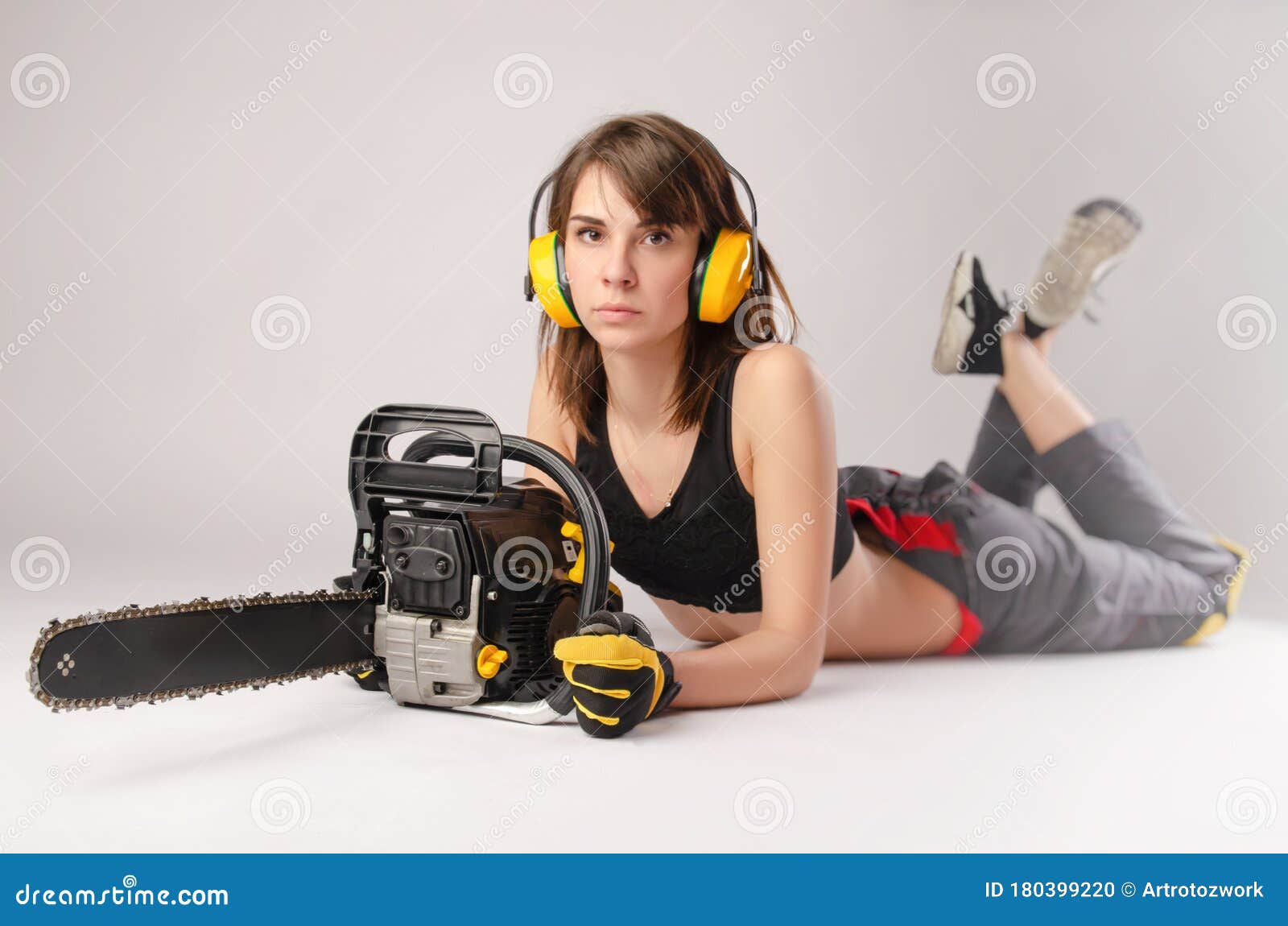 The Girl in Overalls with a Chainsaw Stock Photo Image of carpenter