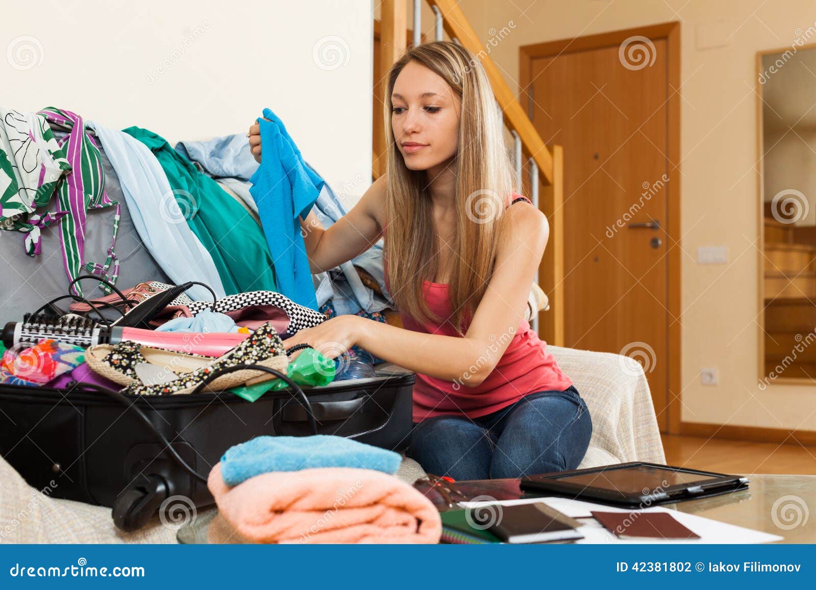 girl packing luggage