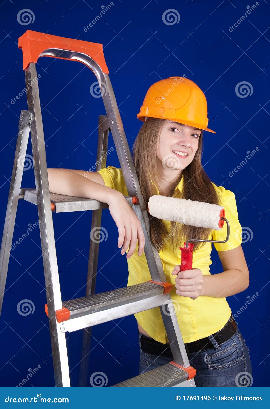 Girl with paint rollers stock photo. Image of house, background 17691496