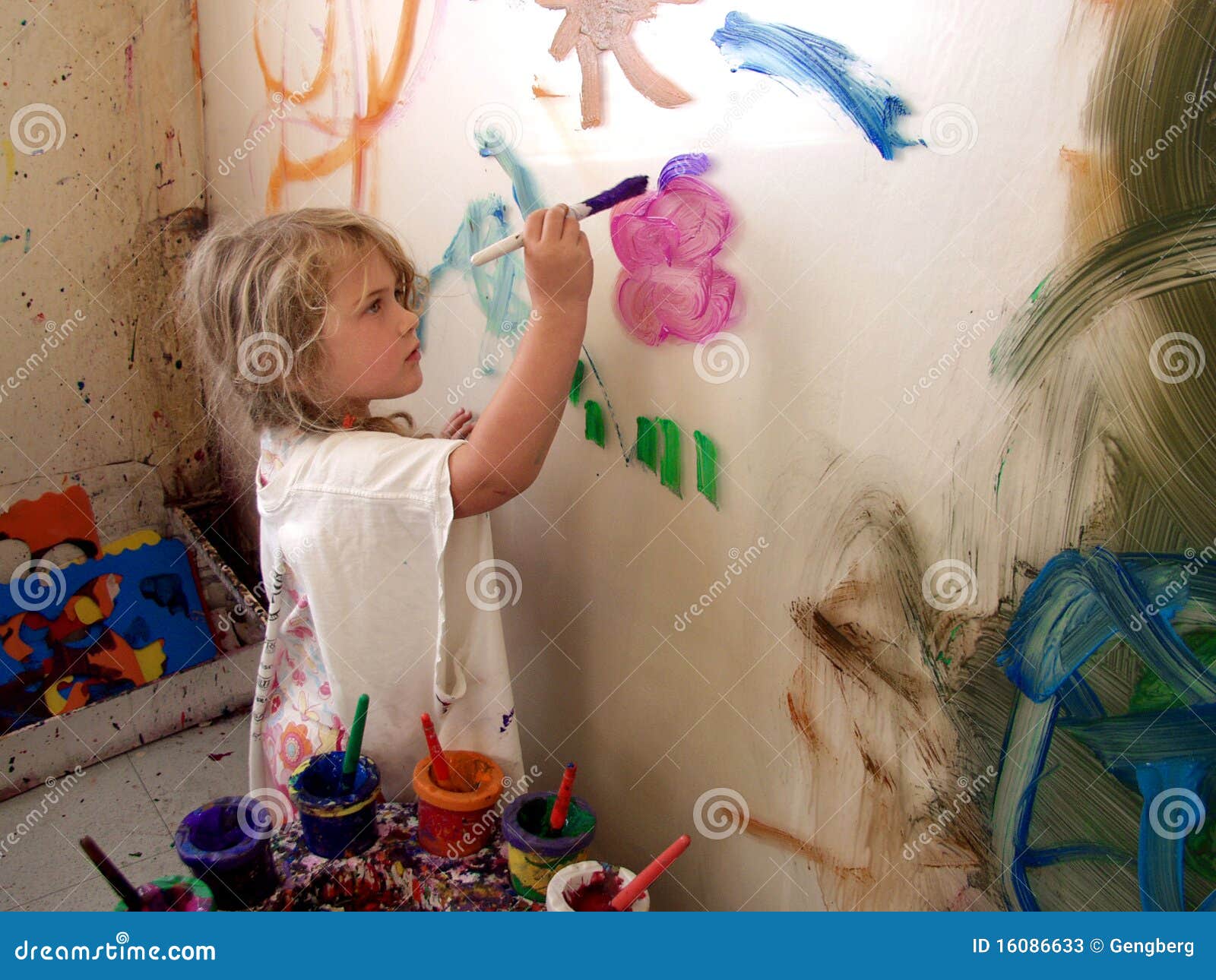 Girl painting on wall stock image. Image of paint, creativity 16086633