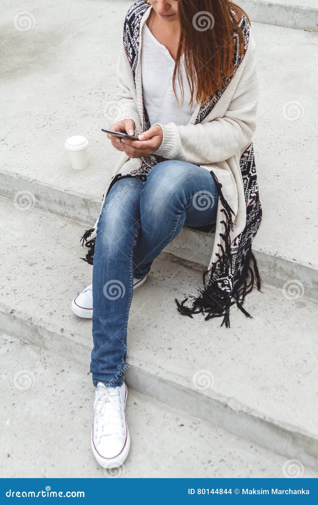 Girl with a phone in hands stock photo. Image of screen - 80144844