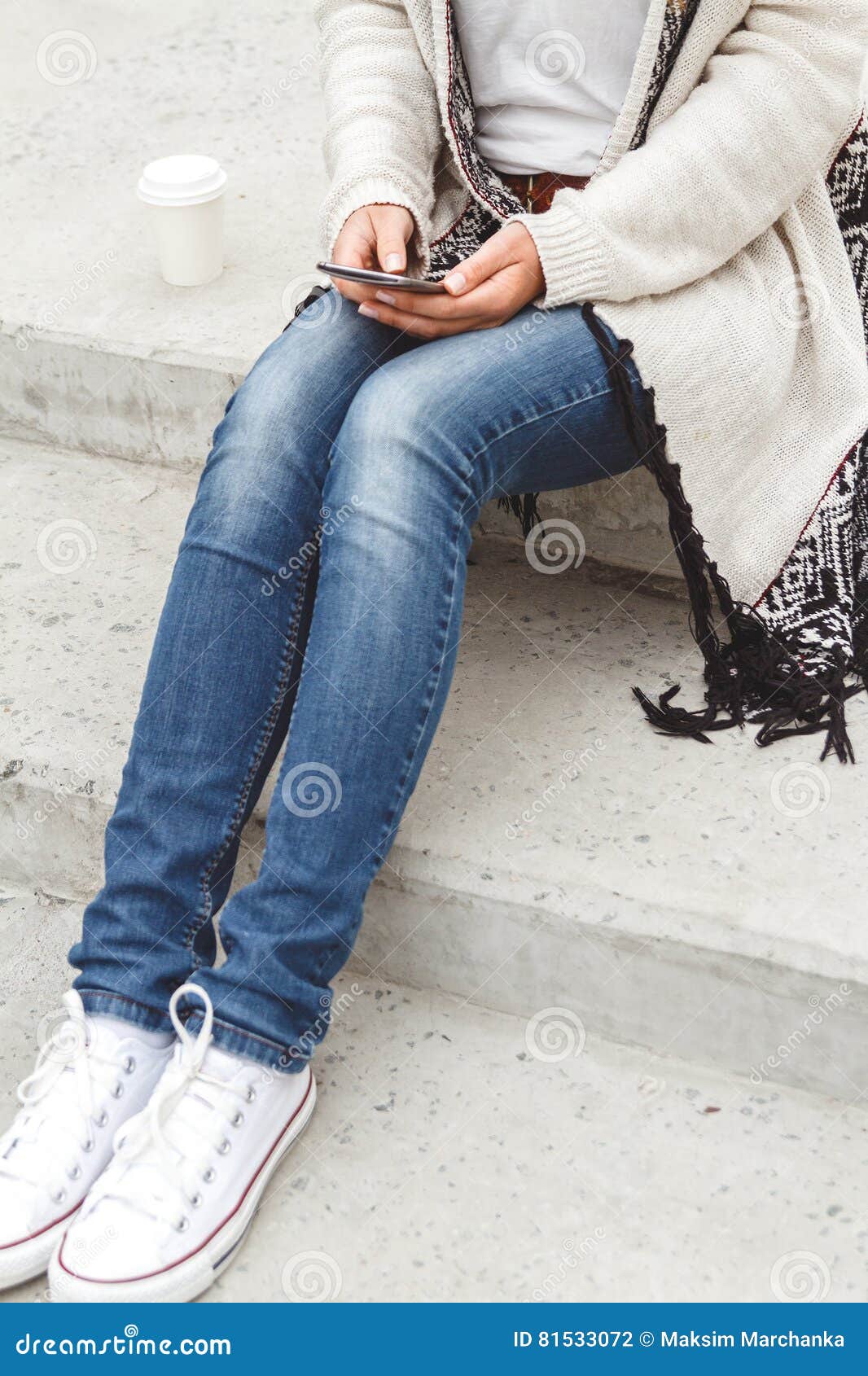 Girl with a phone in hands stock photo. Image of device - 81533072