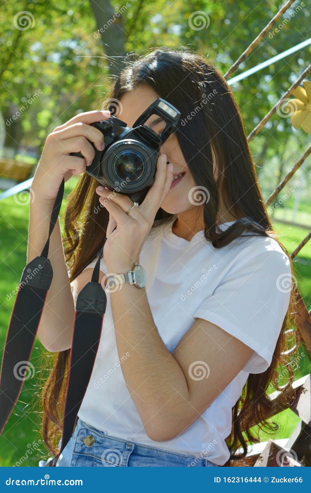 Girl with photo camera stock photo. Image of asian, close 162316444