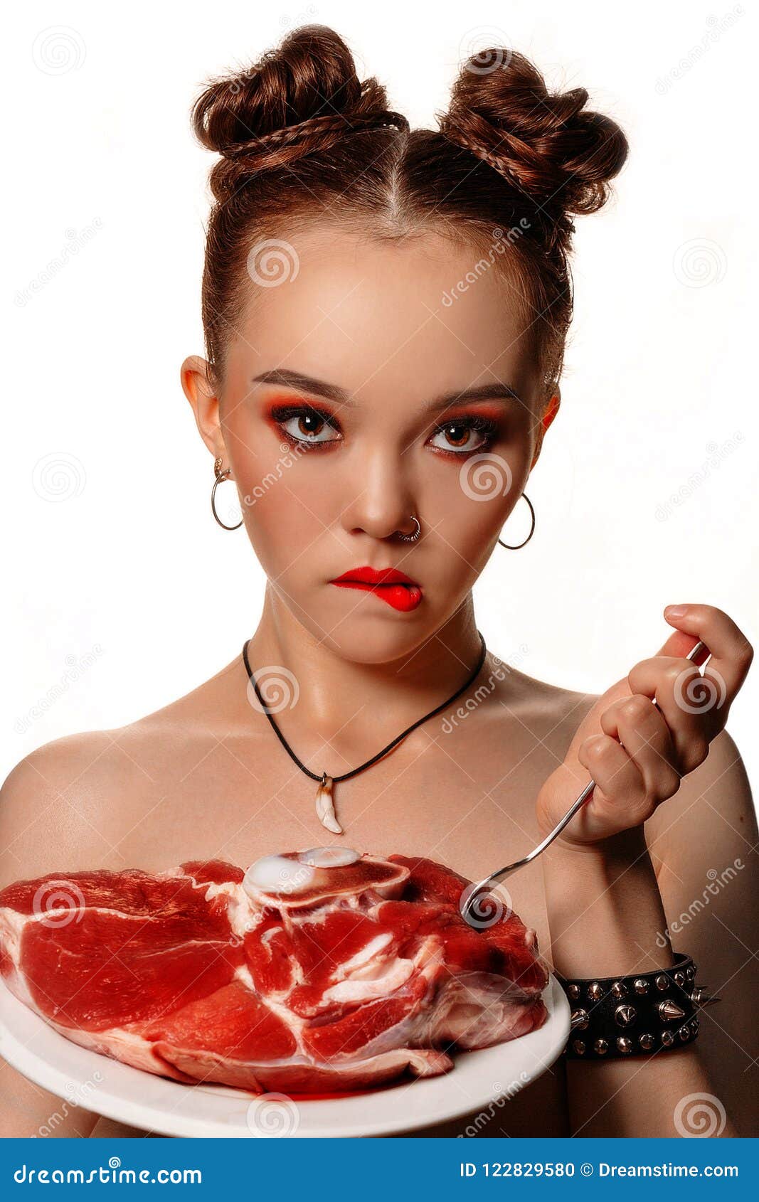 Girl with a piece of meat stock photo. Image of girl - 122829580