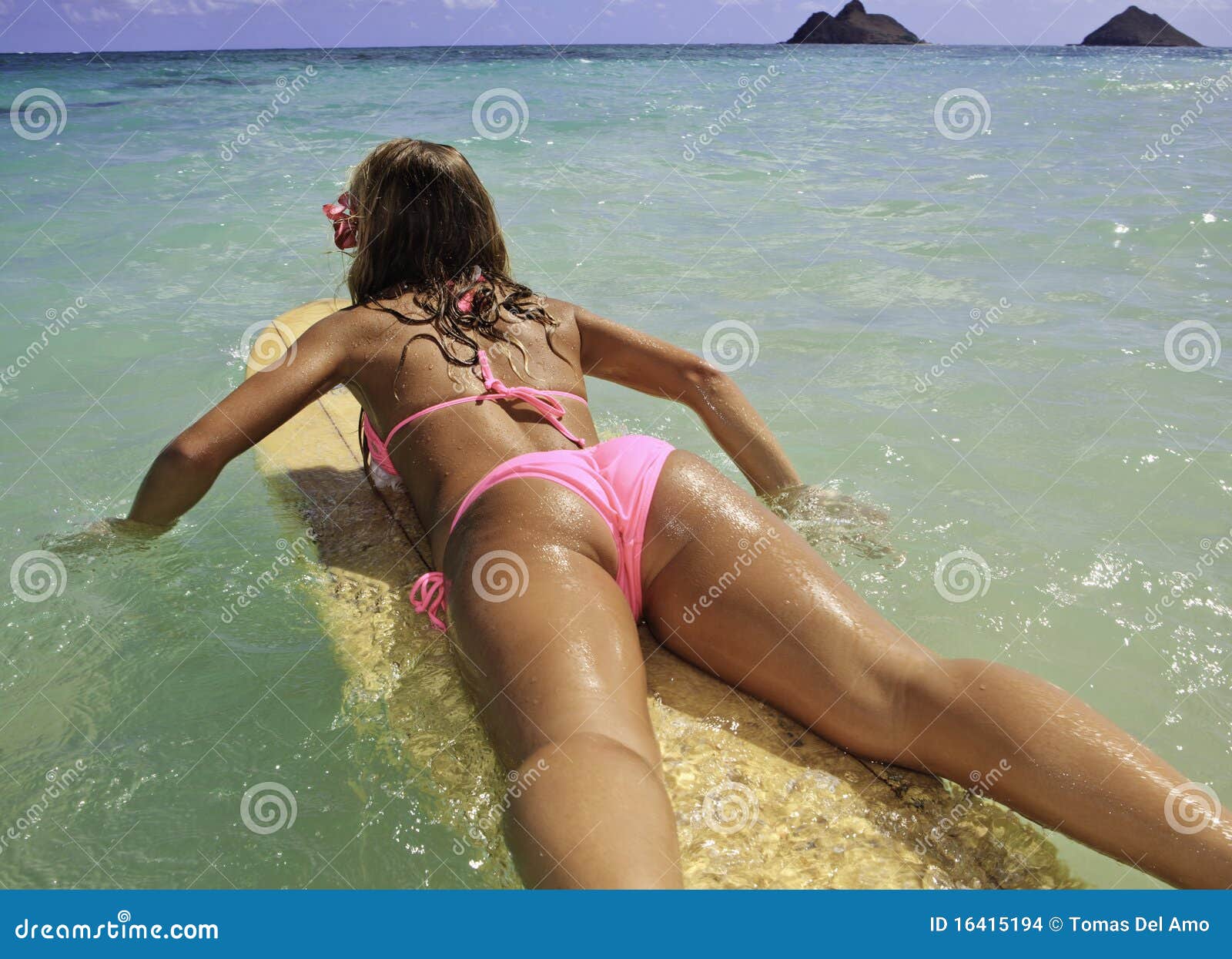 girl in pink bikini at the beach