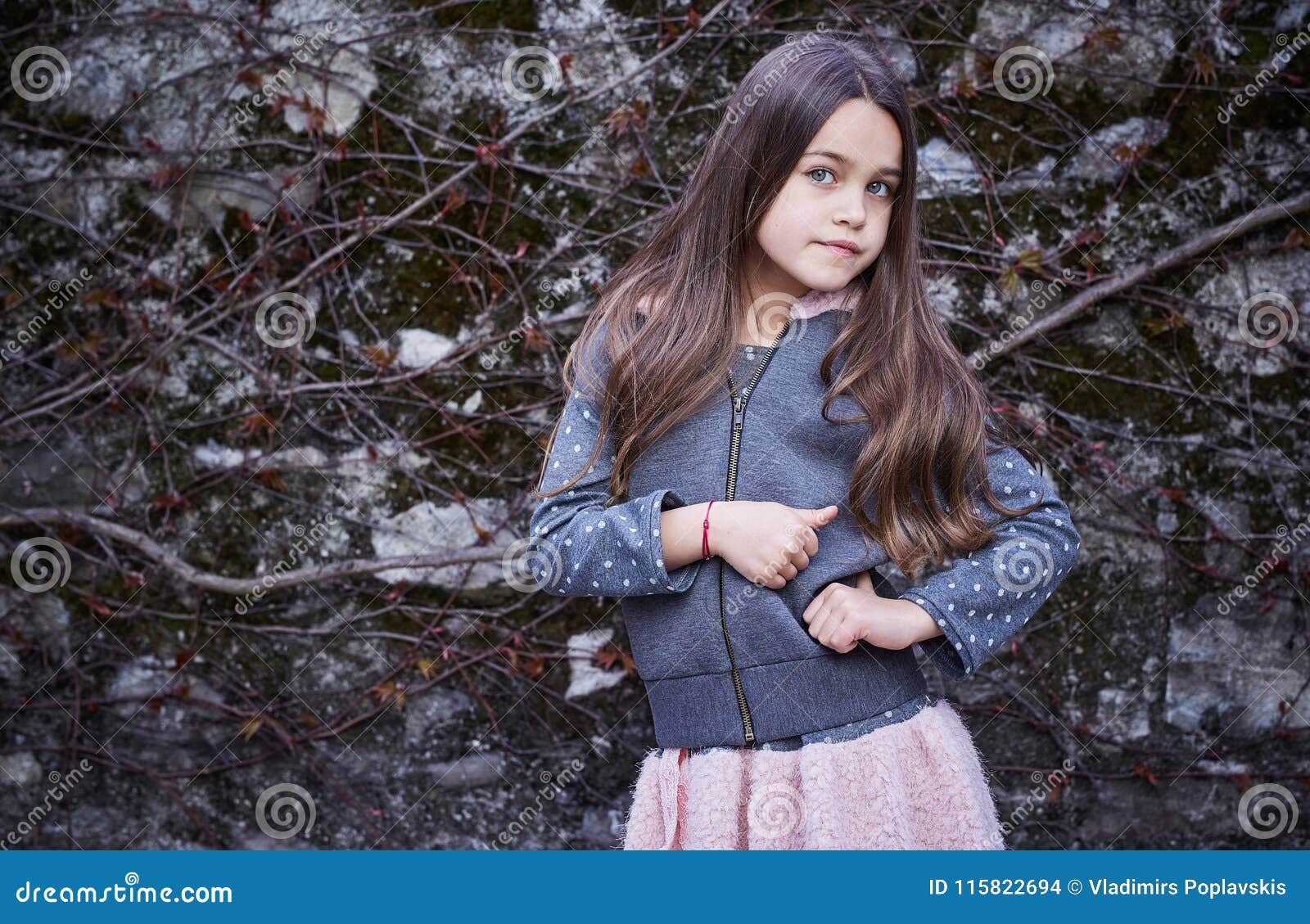 A Girl in Pink Skirt and Grey Jacket. Stock Photo - Image of style ...