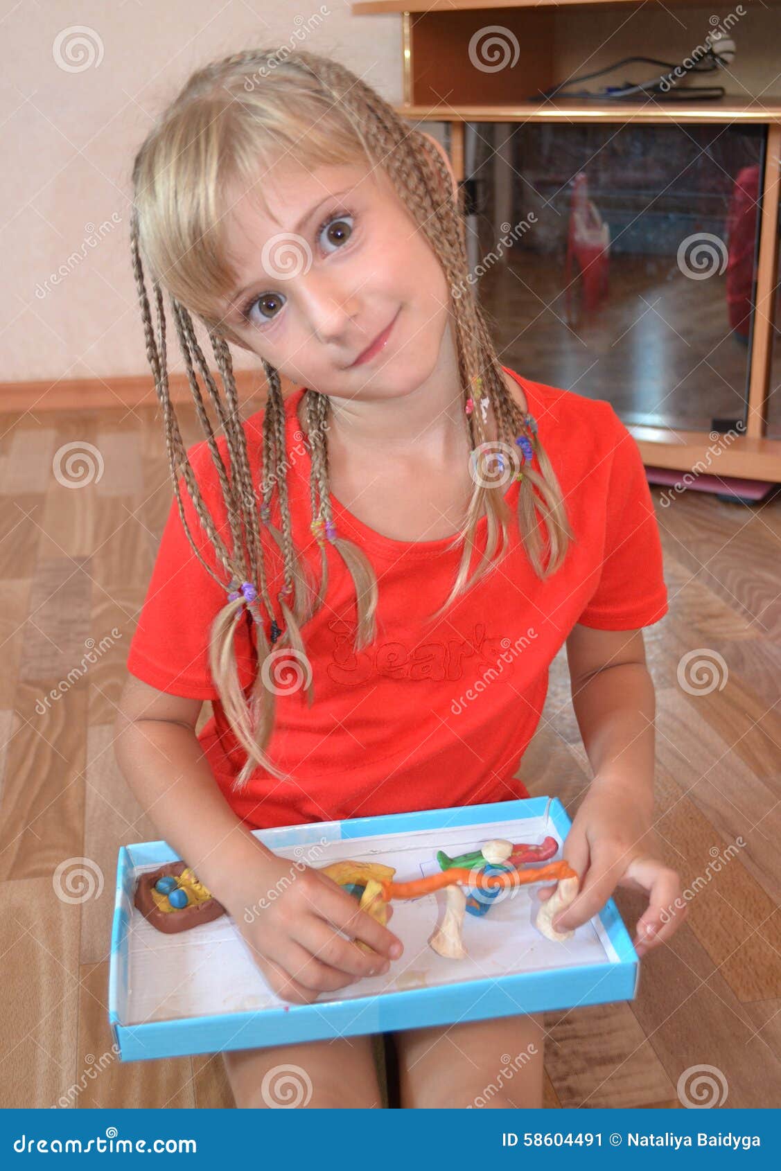 girl and plastilin