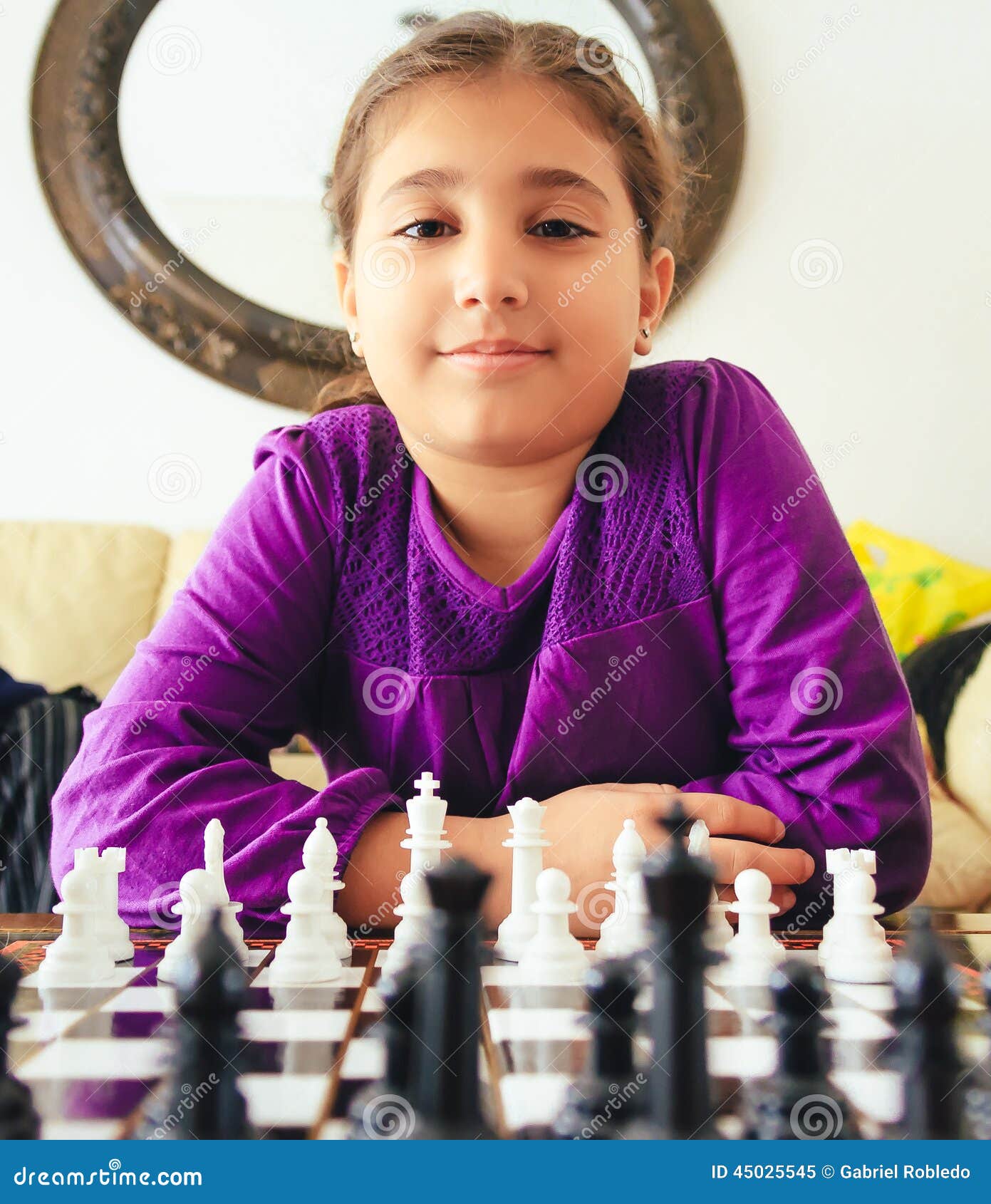 Girl and boy playing chess at home. - a Royalty Free Stock Photo from  Photocase