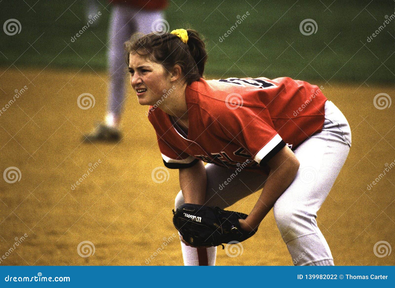 A Girl Playing First Base in a Softball Game Editorial Photography ...