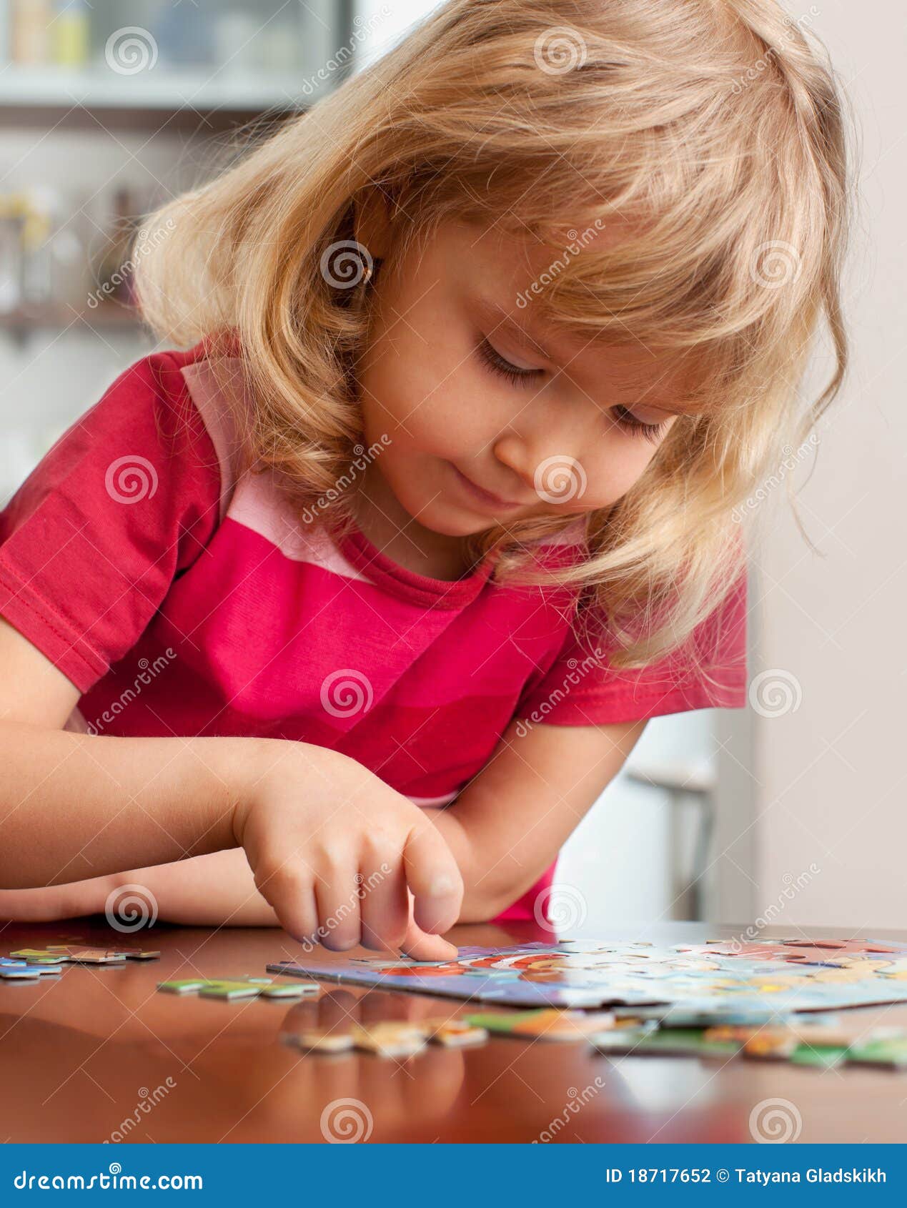 Girl, playing puzzles stock photo. Image of people, caucasian 18717652