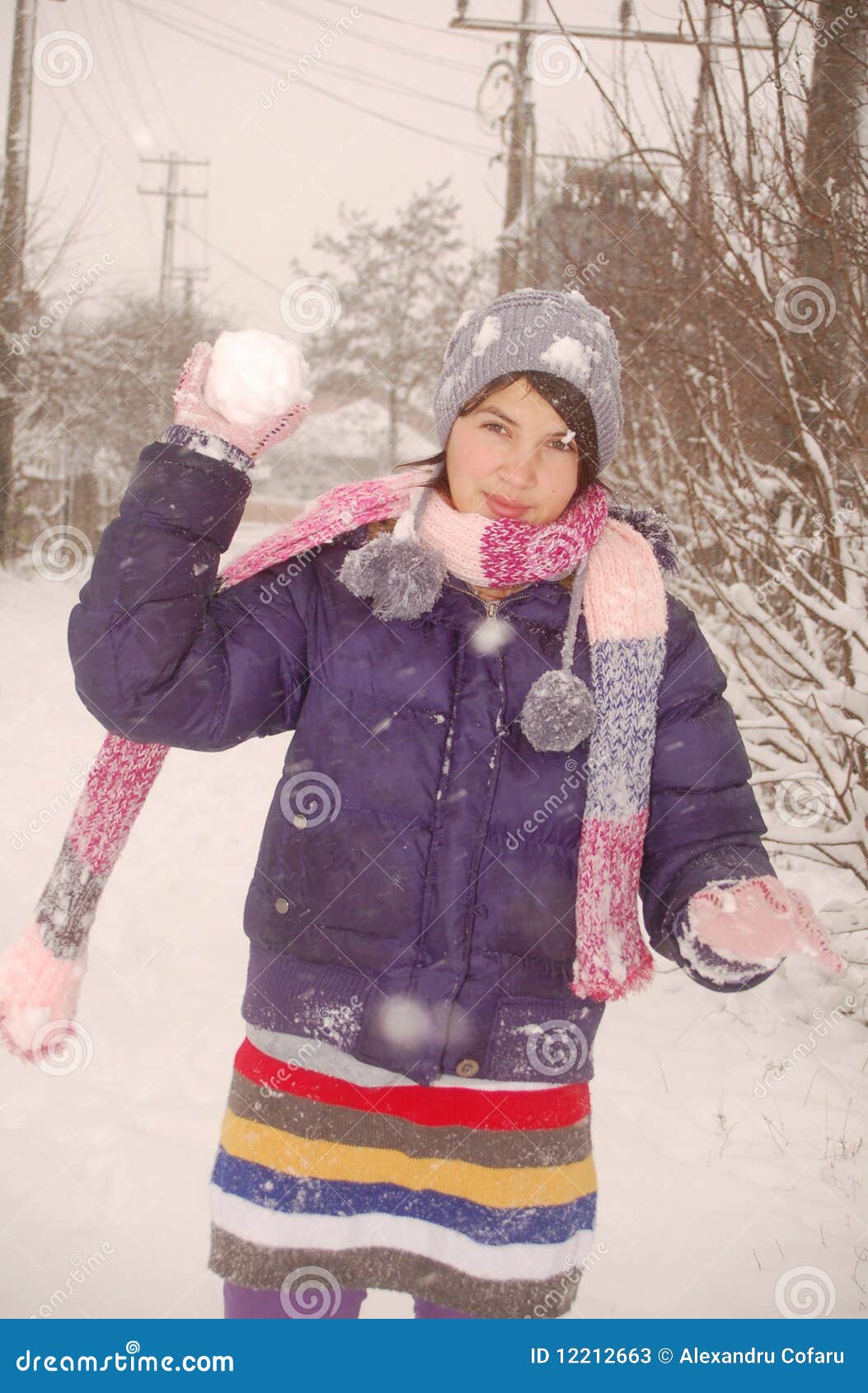 Girl playing in snow stock image. Image of cold, smile - 12212663