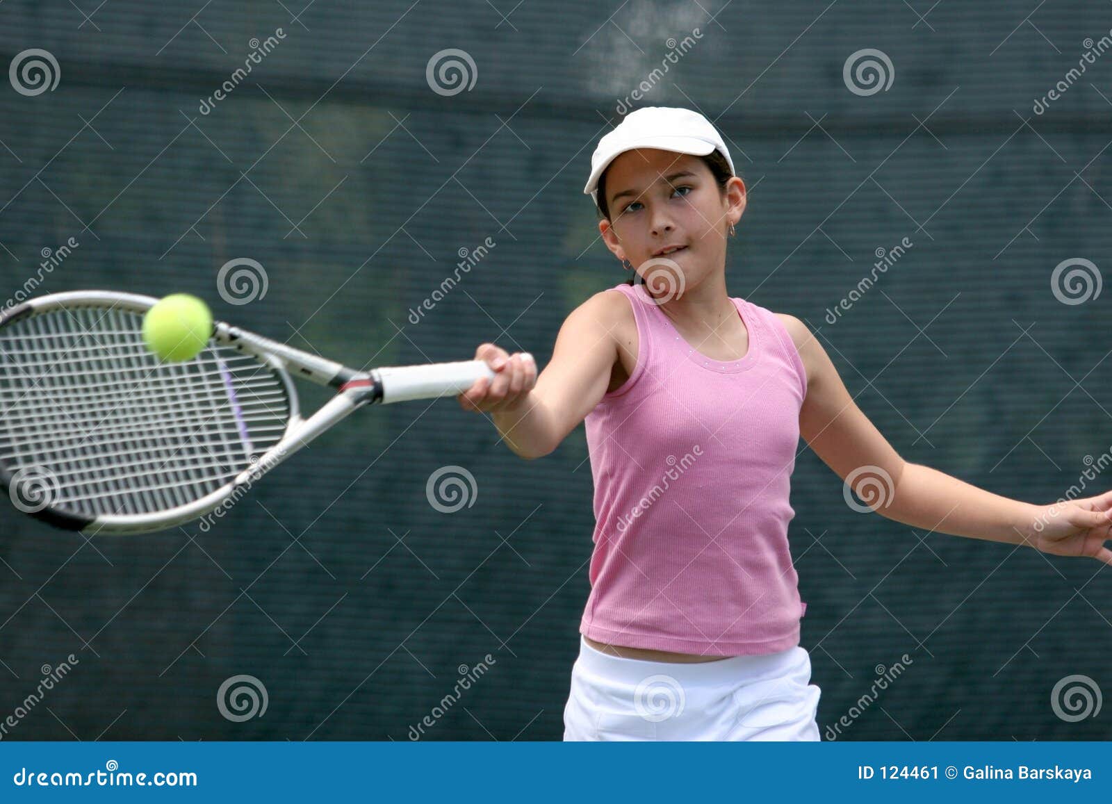 girl playing tennis