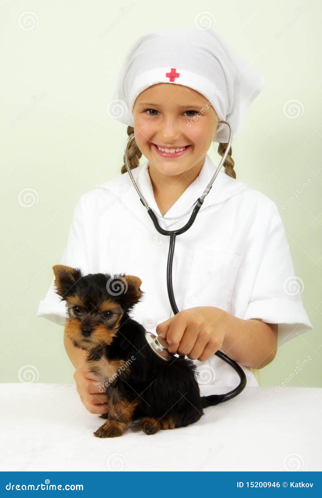 Girl playing veterinarian stock photo. Image of isolated 15200946