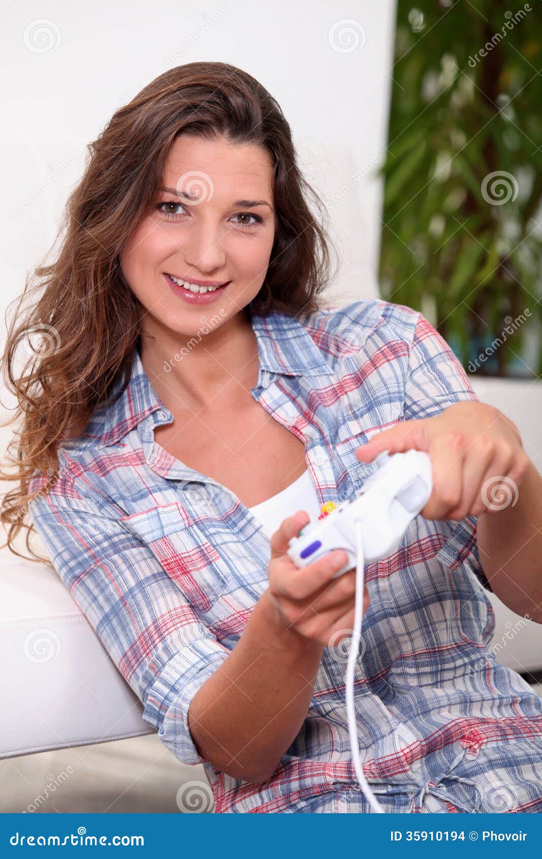 Girl playing video games stock photo. Image of girl, lounge 35910194