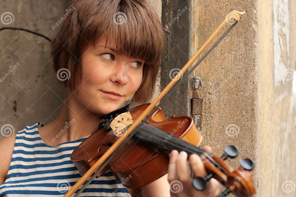 Girl playing violin stock image. Image of outside, music 10508983