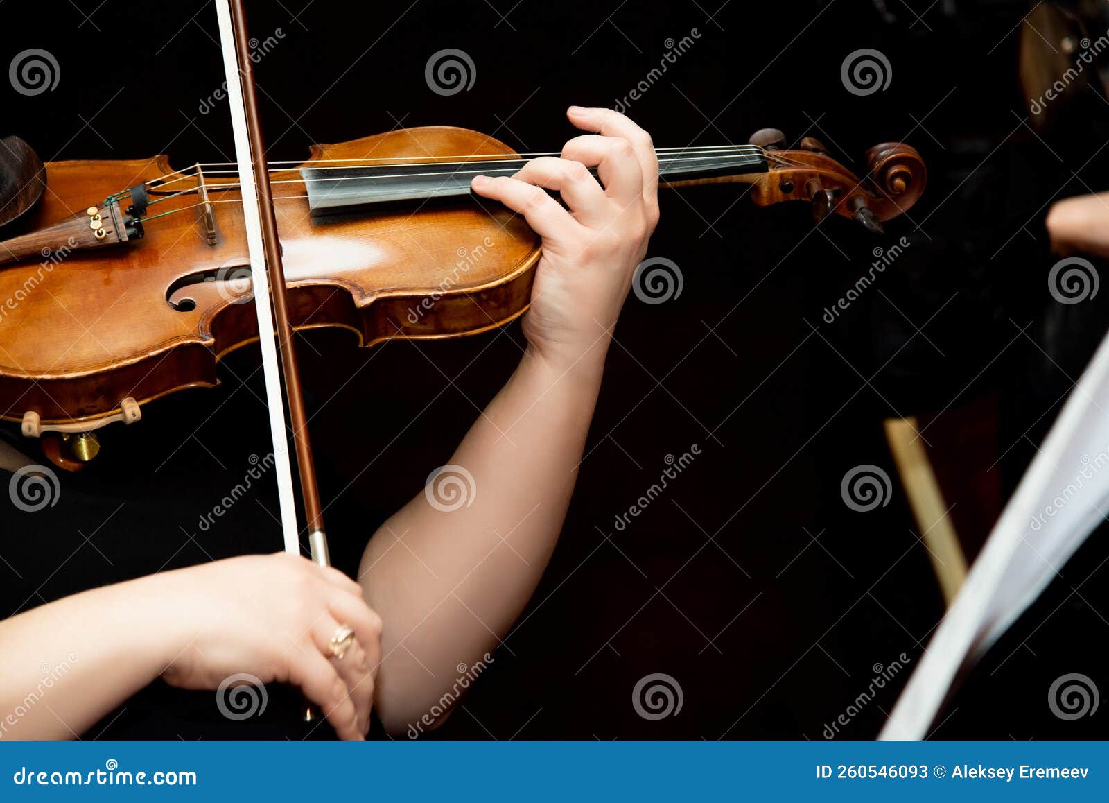 Girl Playing the Violin. Hand of a Girl and a Fiddle Stock Image