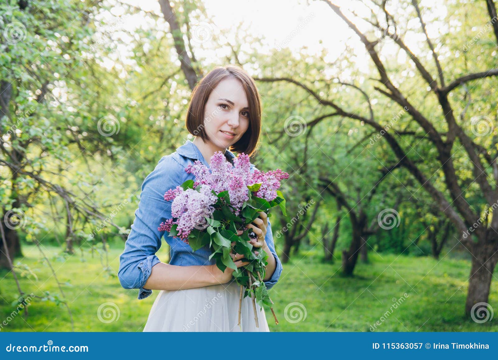 Girl Posing with a Bouquet of Lilac Stock Image - Image of female, lady ...