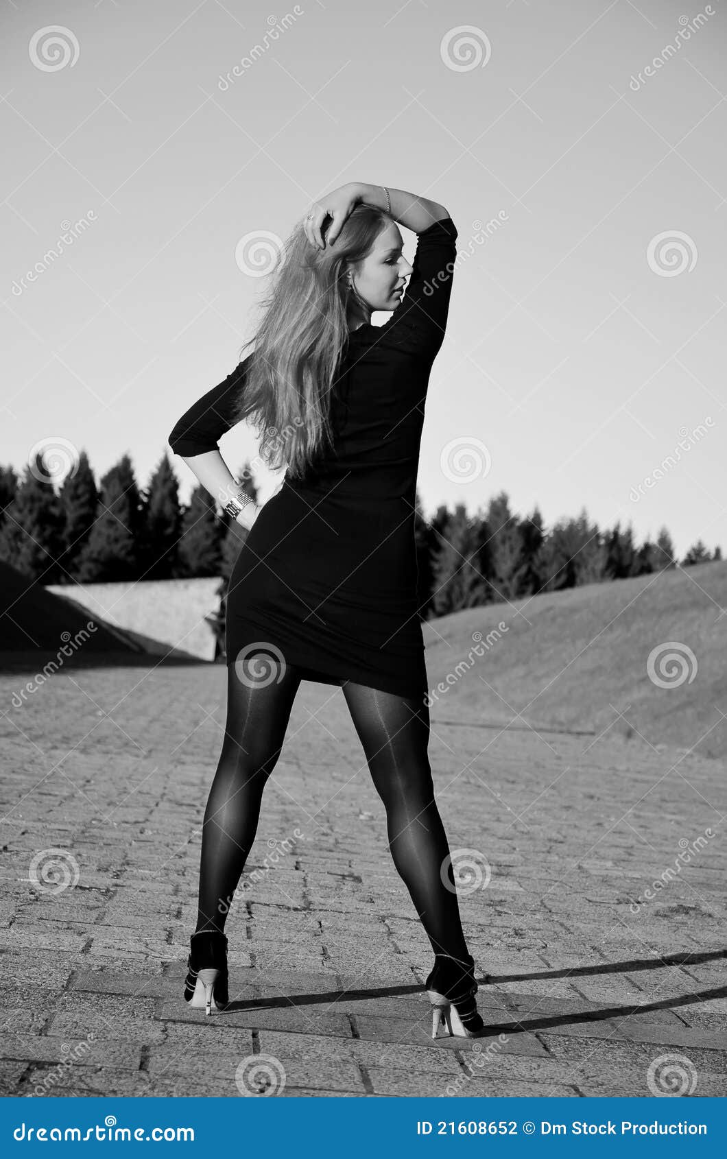 Girl posing on the street stock photo. Image of white 21608652