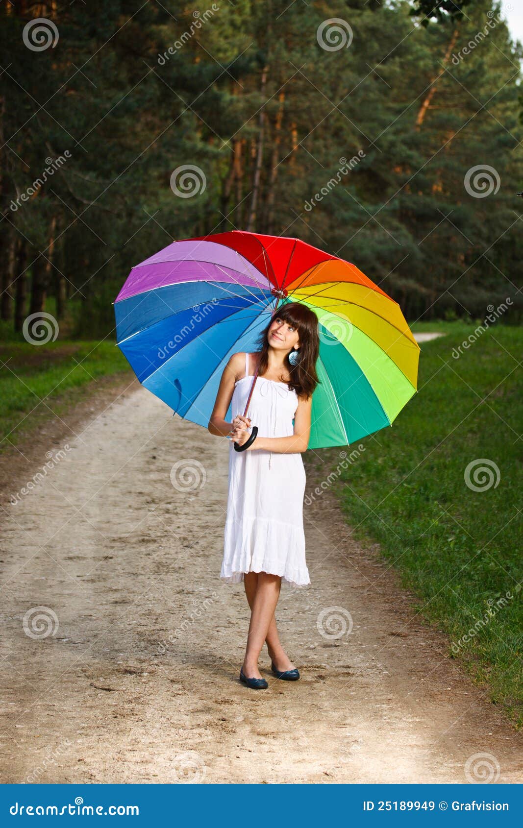 Girl posing with umbrella stock image. Image of rainbow 25189949