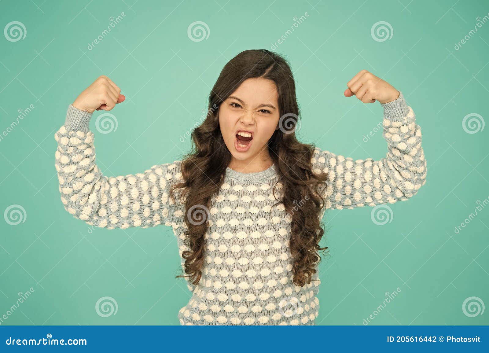 Girl Power. Little Girl Flex Arms Blue Background. Small Girl with ...