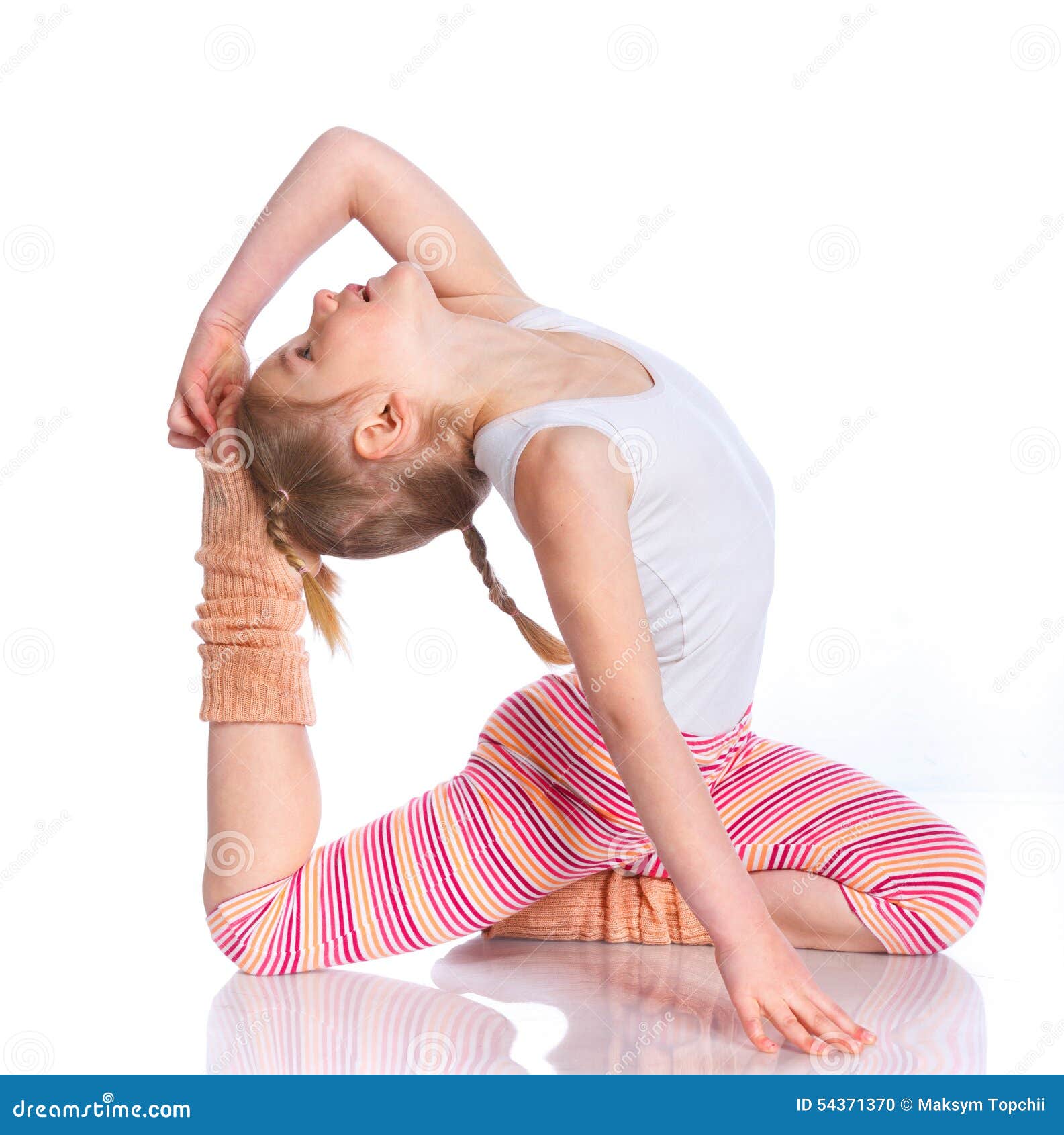 Little cute girl practicing yoga pose, isolated on white :: Stock