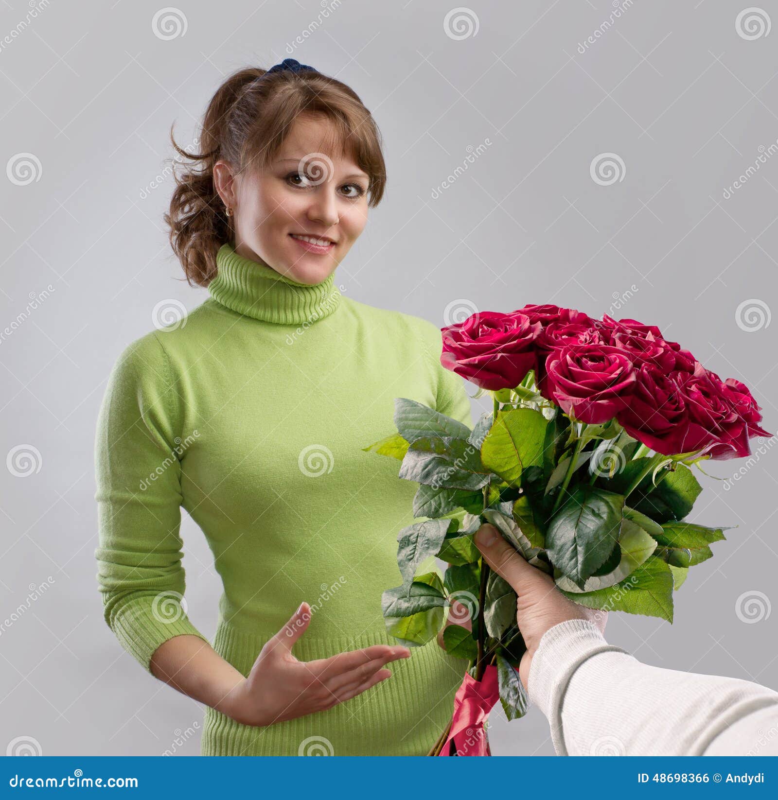 girl presented with a bouquet of flowers