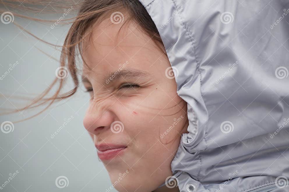 Girl pulling funny face stock image. Image of cold, scrunched 28616973