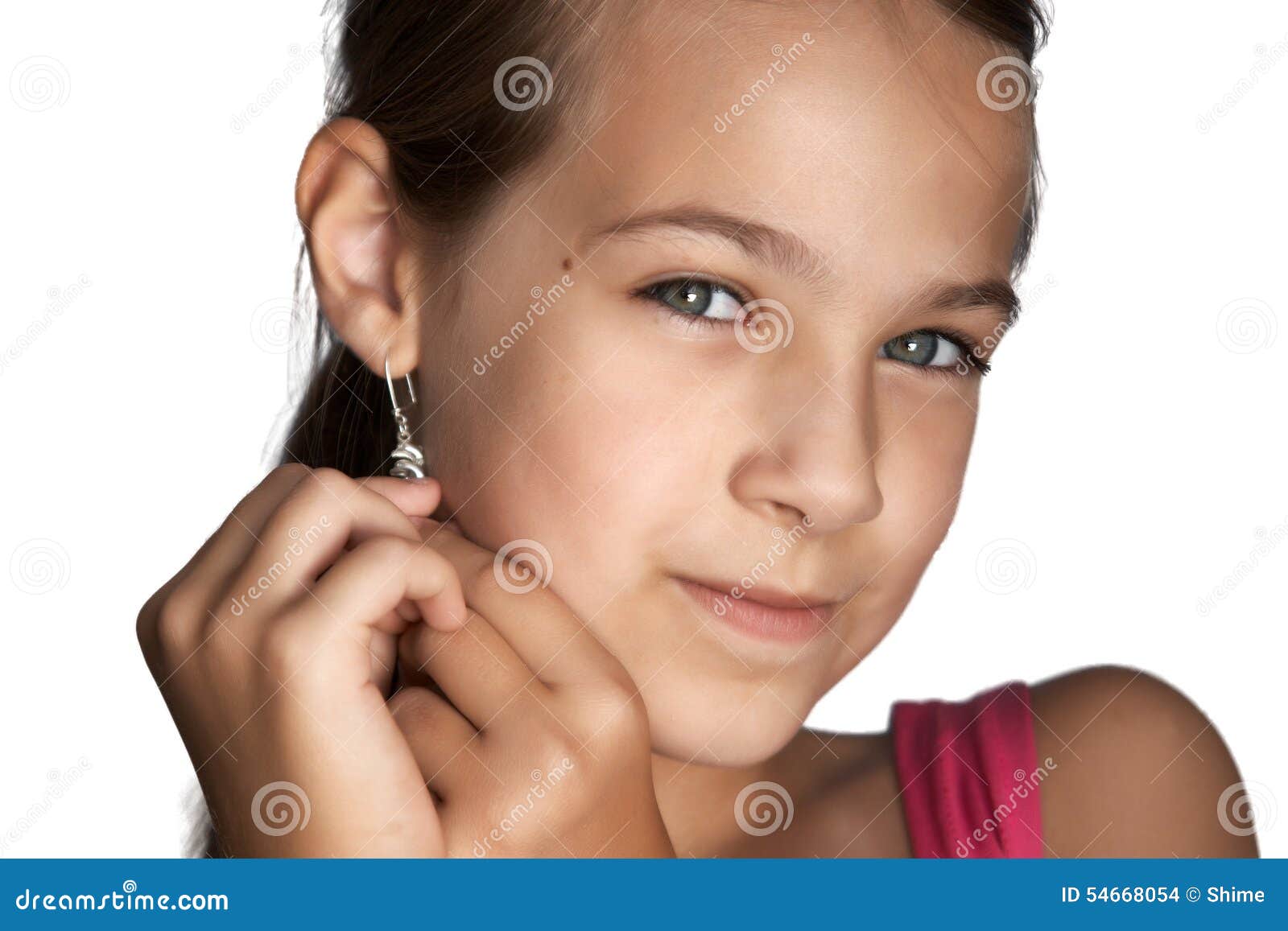 Girl puts earrings stock photo. Image of style, female 54668054