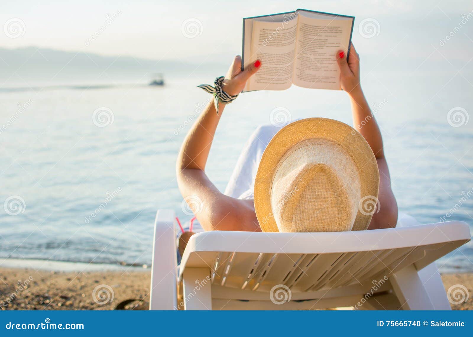 Girl Reading a Book in Sunbed Stock Photo Image of sunset, novel