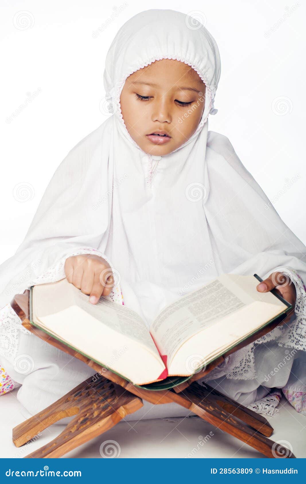 Girl Reading The Quran Royalty Free Stock Images - Image 