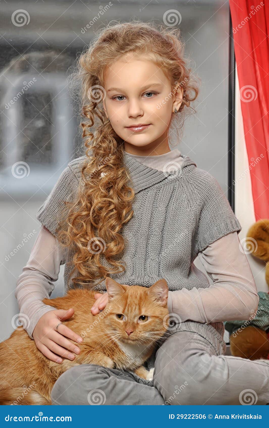 Girl with a red cat stock photo. Image of face, child 29222506