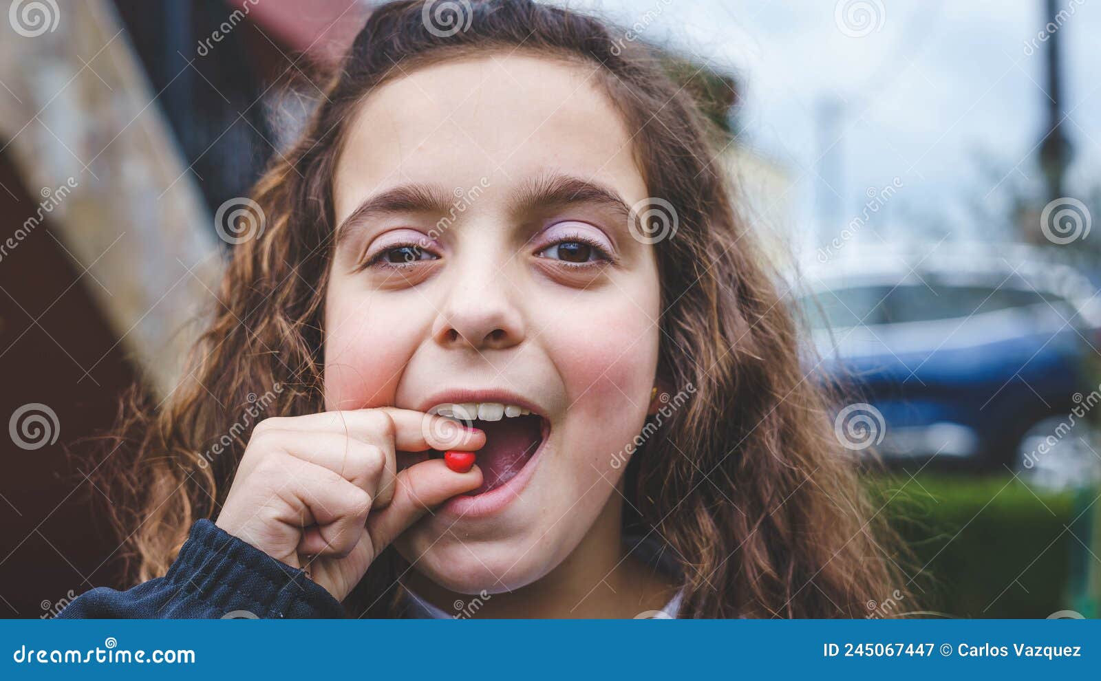 girl with red fruit