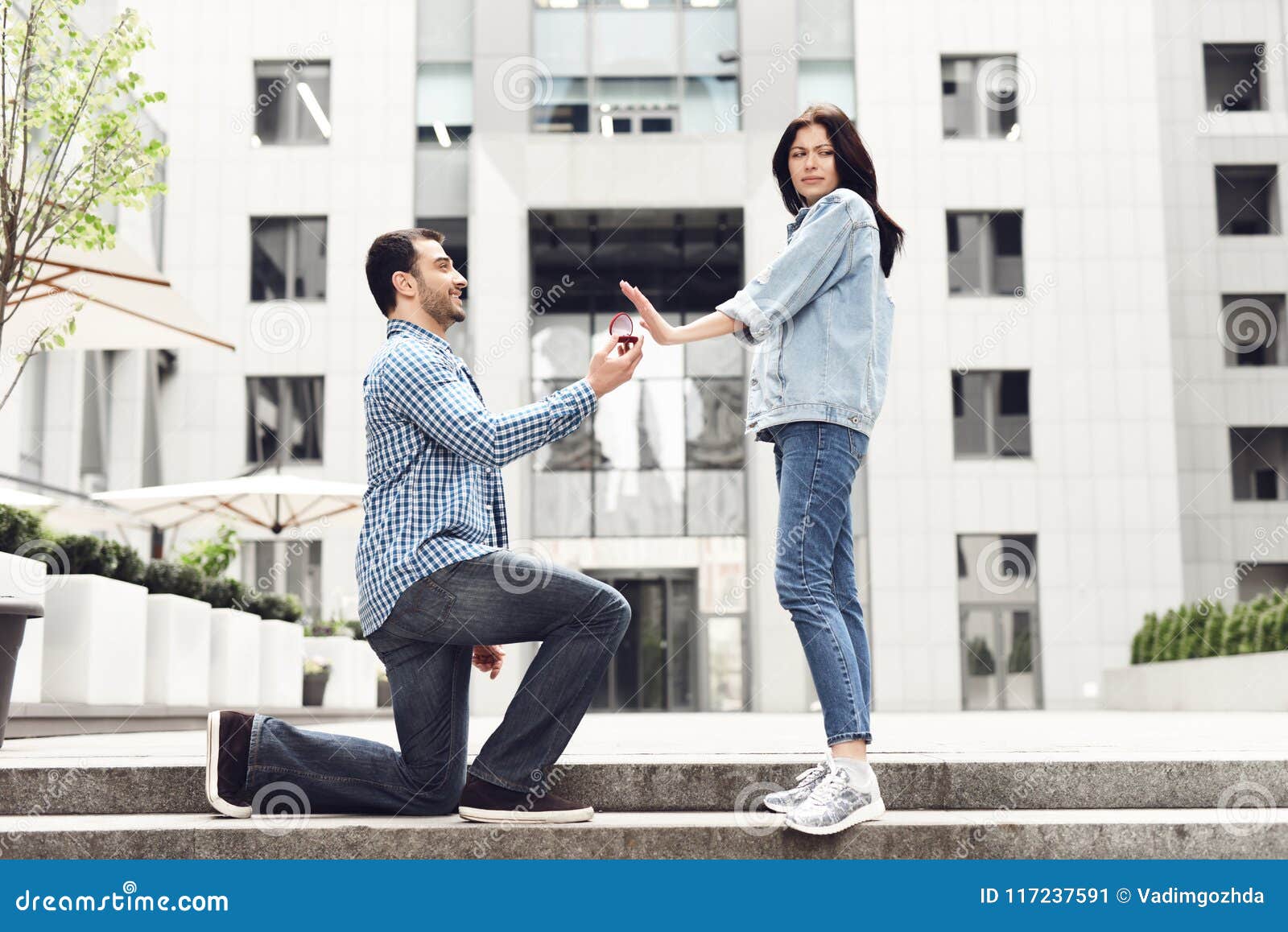The Girl Refuses the Boy in the Marriage Proposal. Stock Image ...