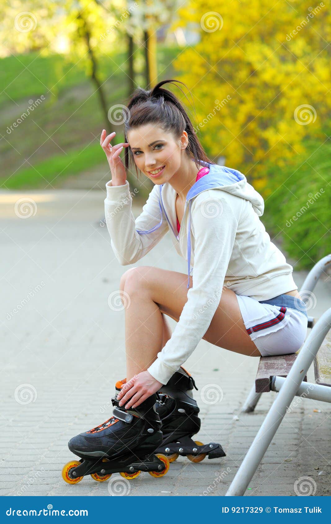 Girl Rides Rollerblades In The Park Stock Image Image 9217329