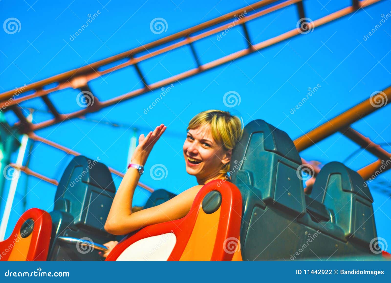 Girl Riding on a Roller Coaster Stock Photo Image of summer, blur