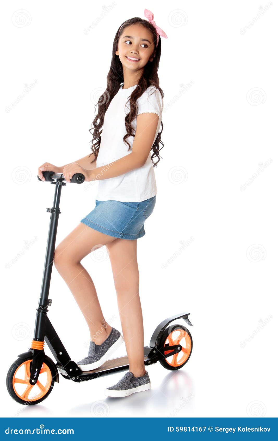 girl riding a scooter