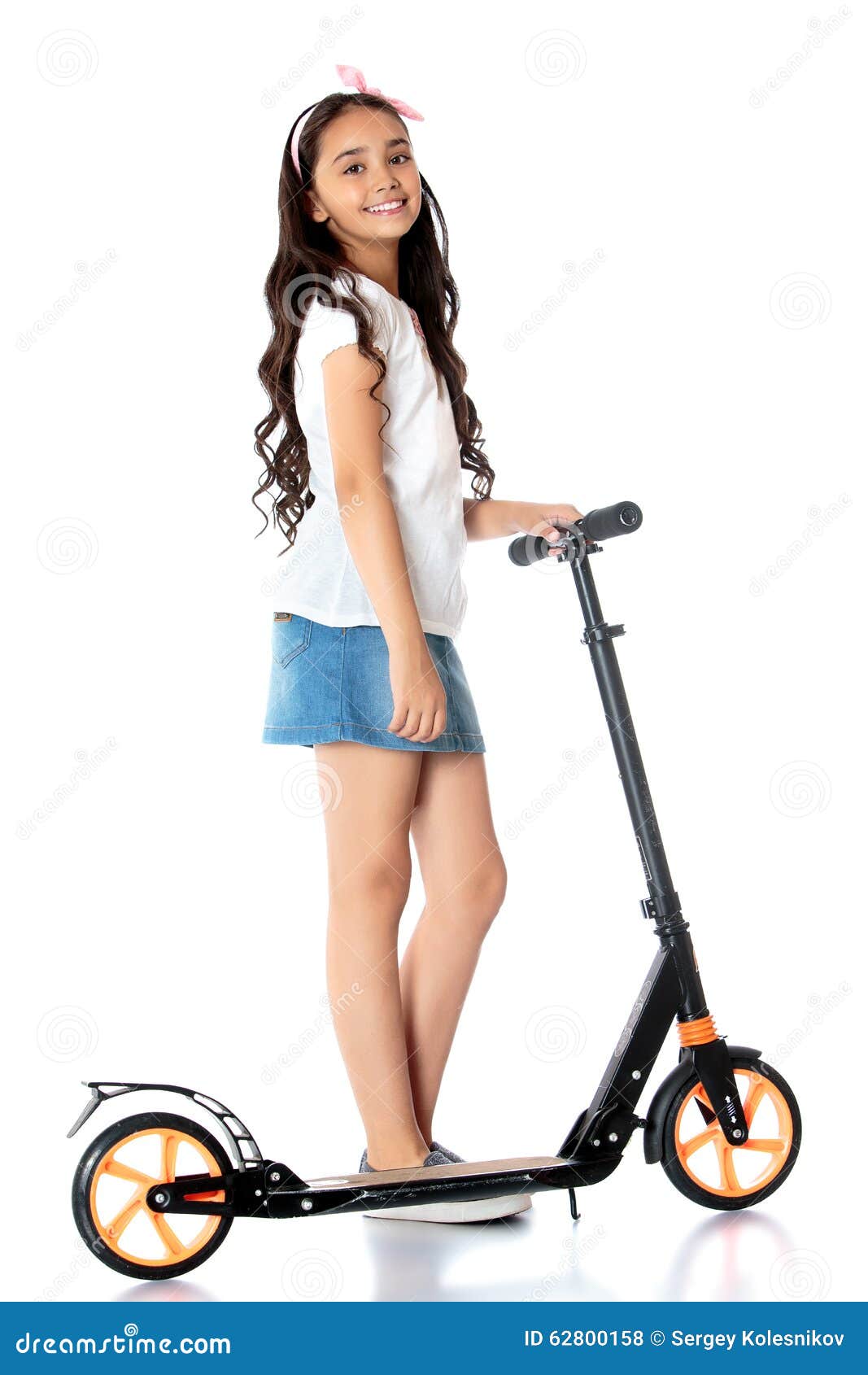 girl riding a scooter