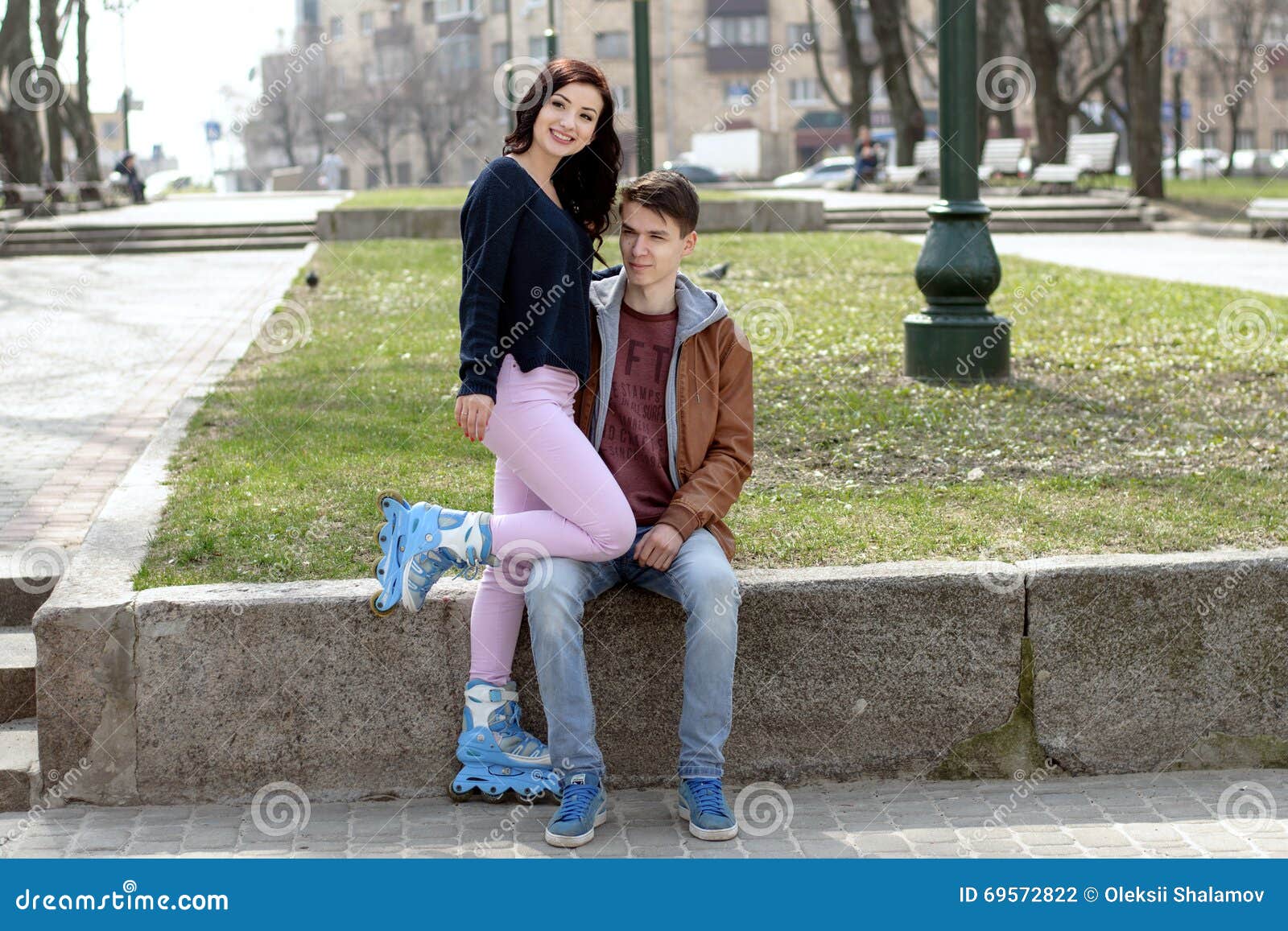 Girl Sitting On Boy Lap