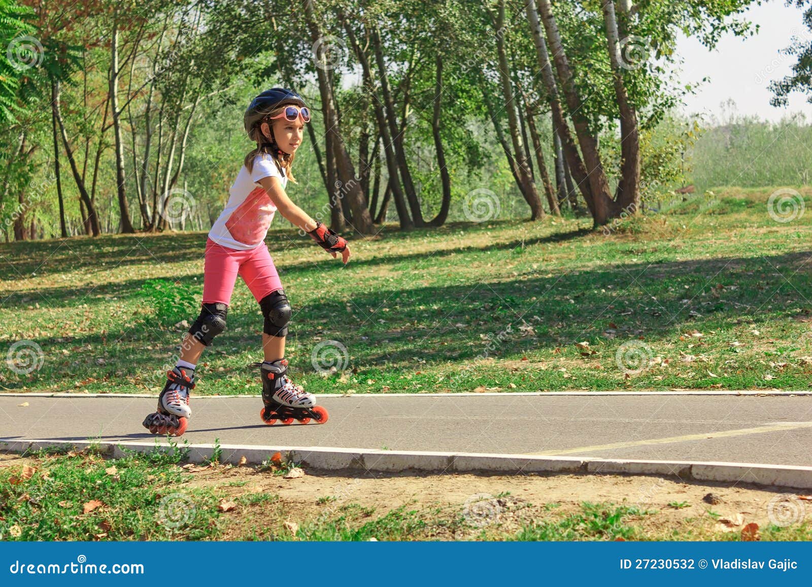 Girl on the rollerblades stock photo. Image of rollerblades 27230532