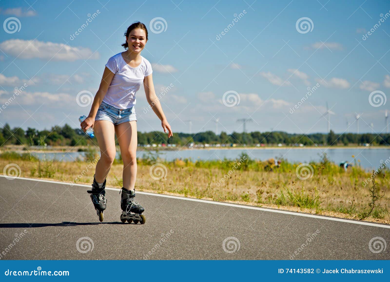 Girl on rollerblades stock photo. Image of movement, skate 74143582