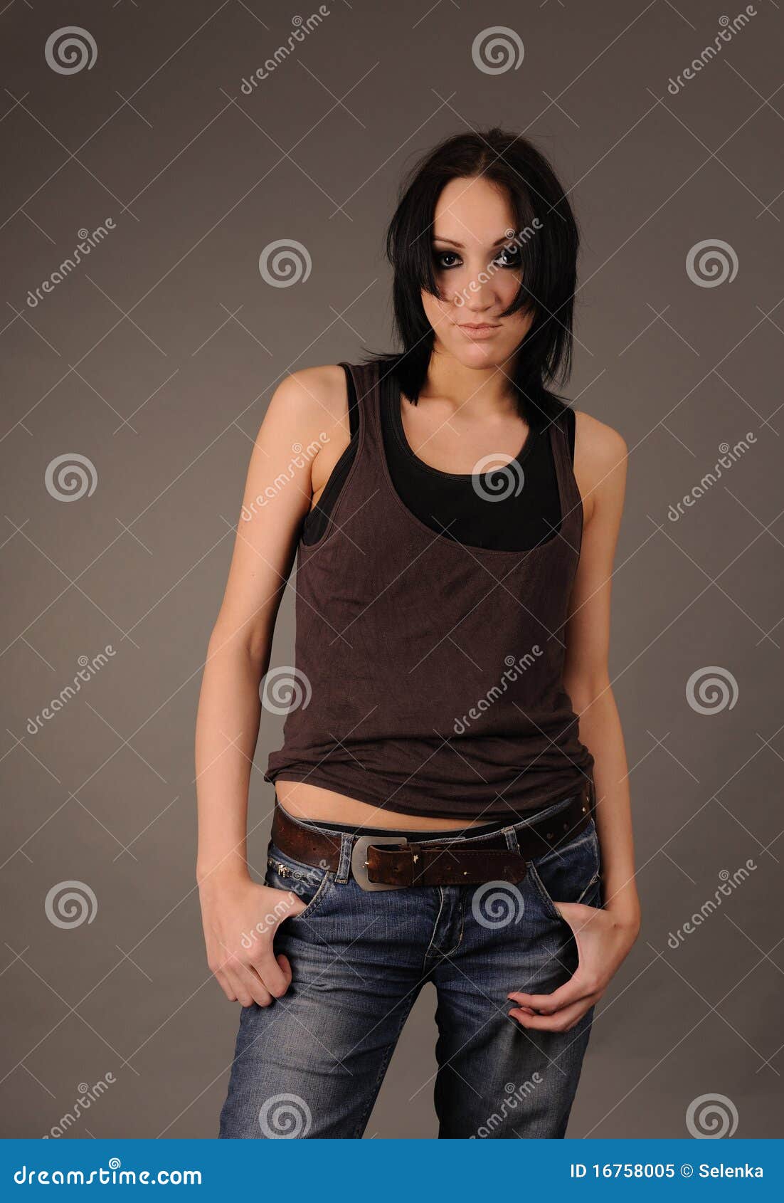 girl in rumpled shirt and jeans.