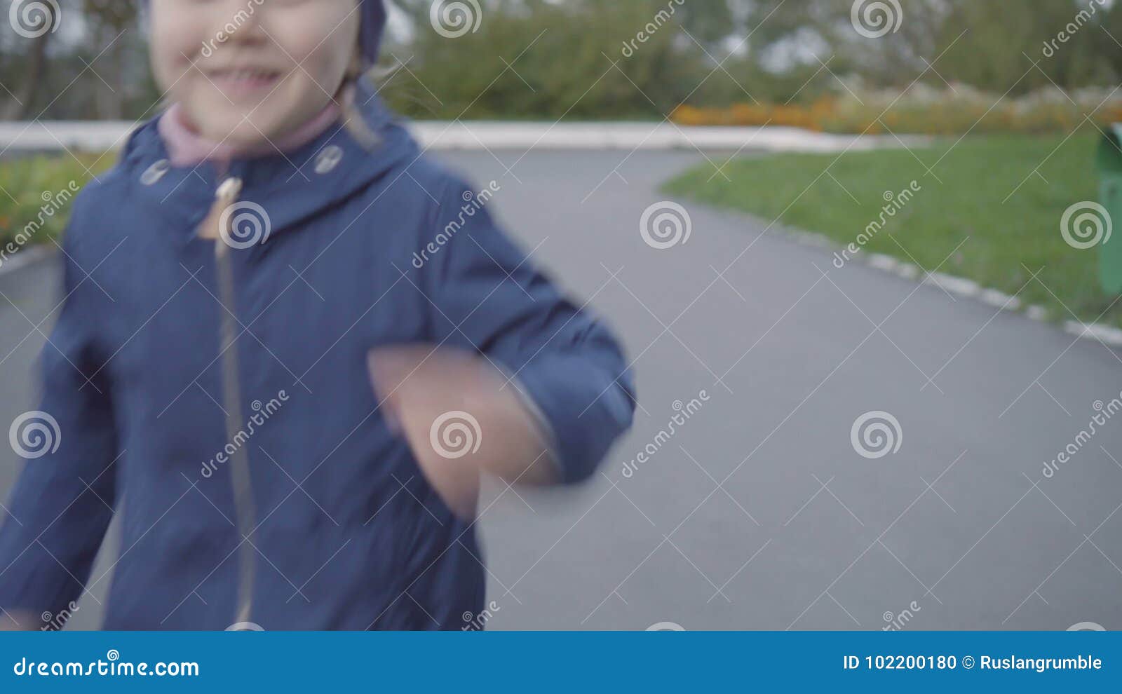 Girl running and laughing stock footage. Video of park 102200180