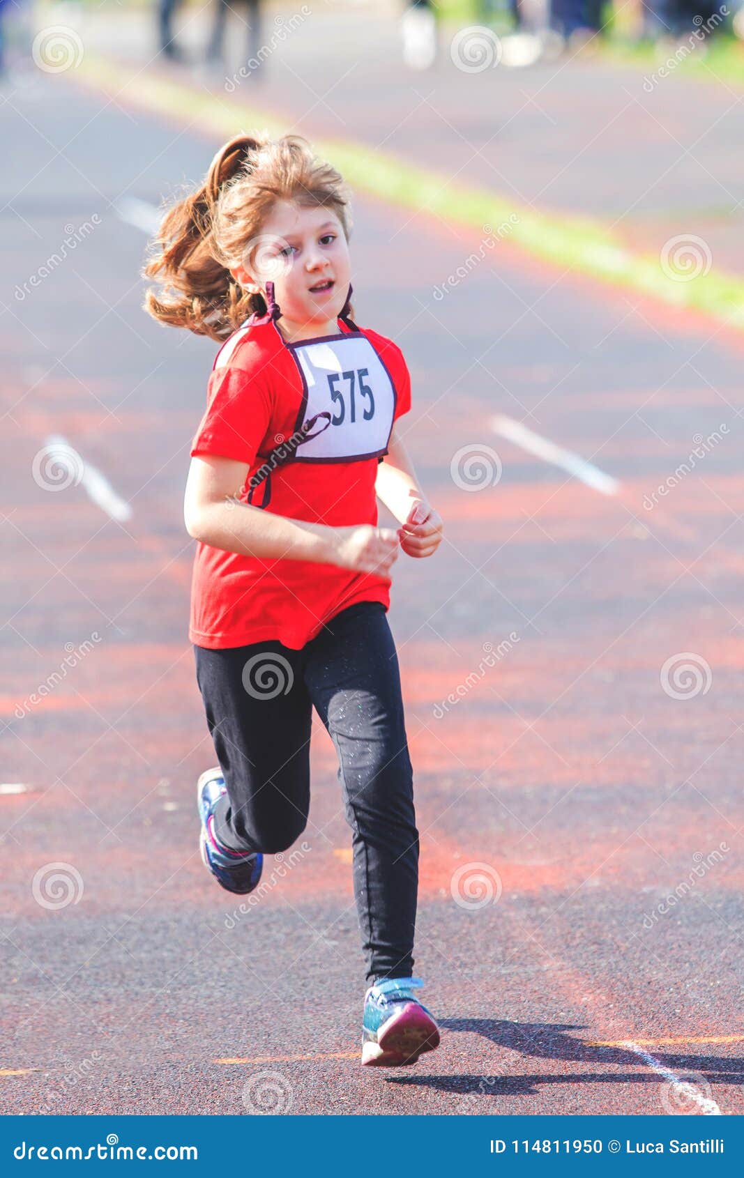Girl running during a race stock photo. Image of competition 114811950