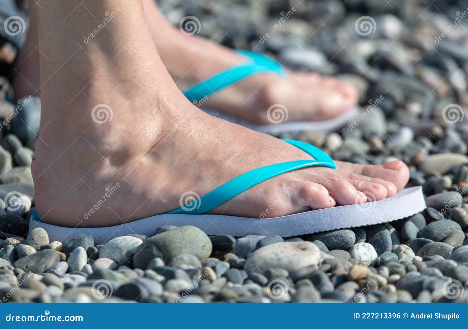 Girl& X27;s Feet on the Pebbles Stock Photo - Image of stone ...