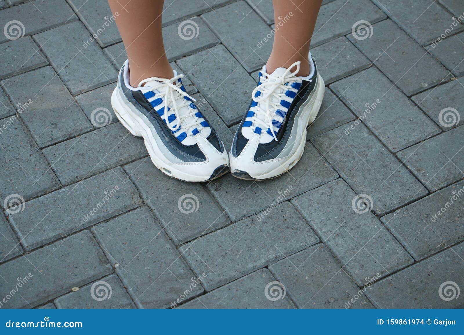Girl`s Feet in Sports Shoes Stock Photo - Image of girl, active: 159861974