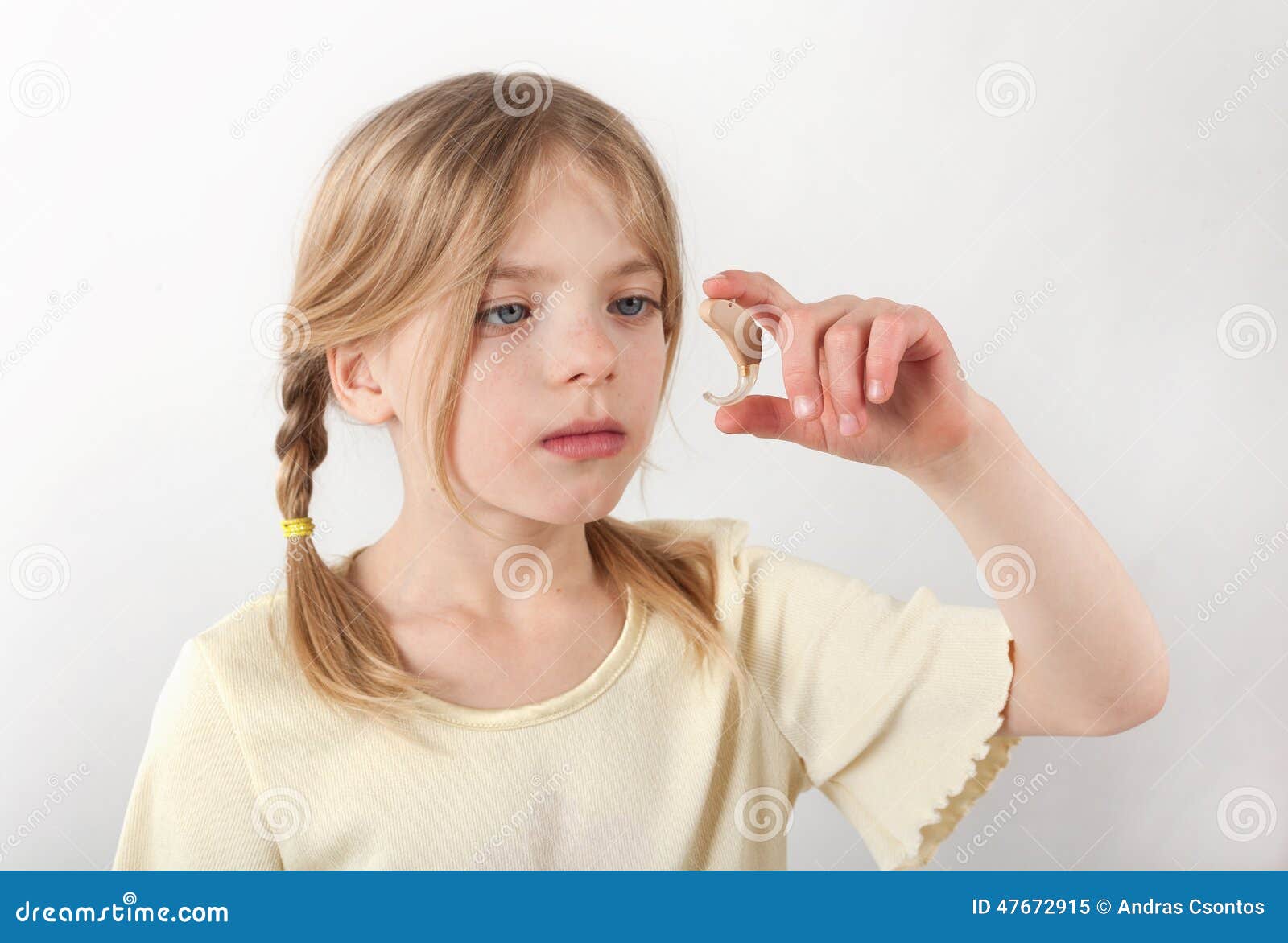 Girl s new hearing aid stock image. Image of blue, ispect - 47672915