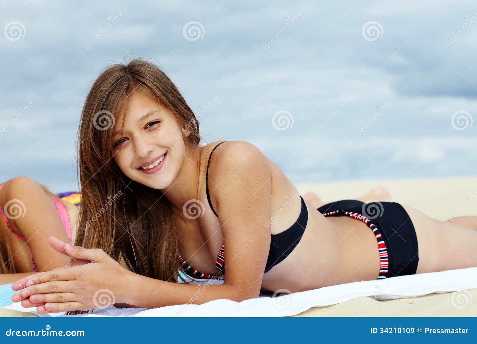 Girl on sand stock image. Image of looking, positive - 34210109
