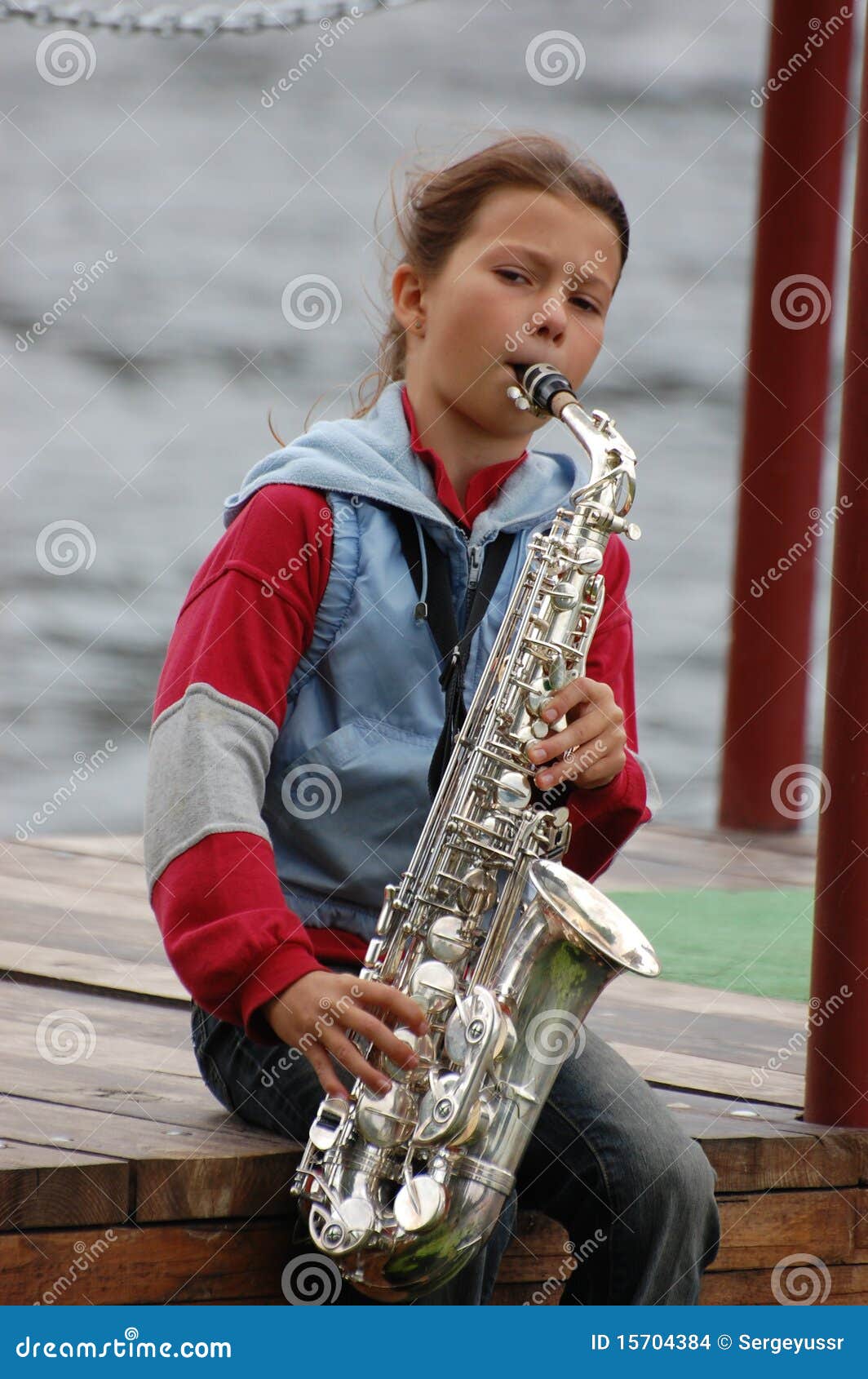 Girl with saxophone stock photo. Image of female, sound 15704384