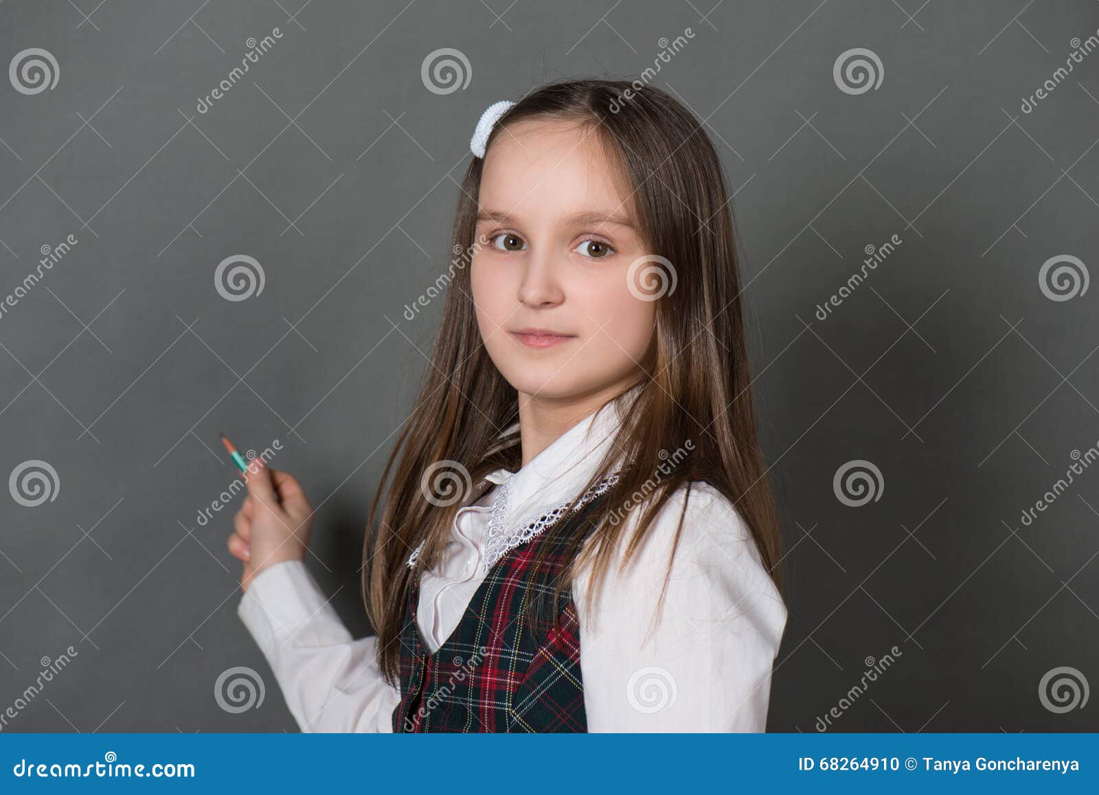 Girl in School Uniform Standing at the Chalkboard Stock Photo Image